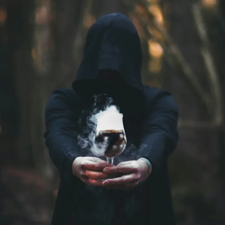Chaos Magick mentor holding a chalice with magick potion
